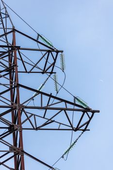 high voltage electric pole on the background of sky