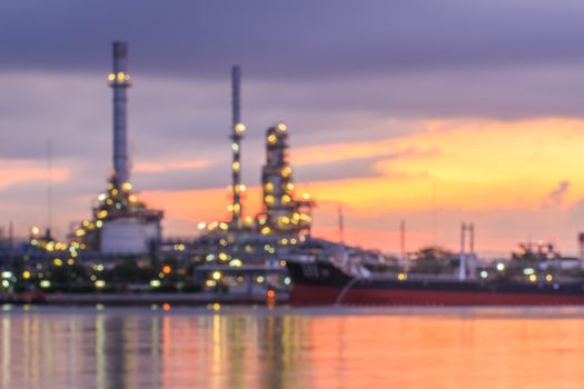Blurred Oil refinery at twilight. blur backgrounds concept