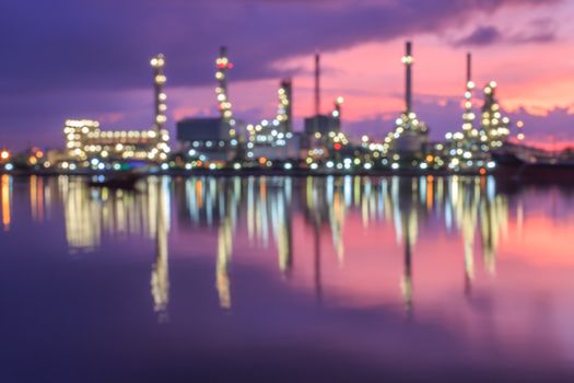 Blurred Oil refinery at twilight. blur backgrounds concept
