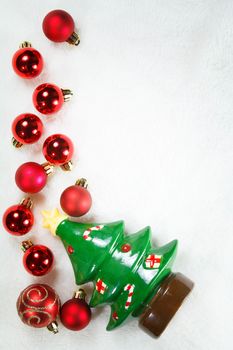 Christmas balls and tree on White fur background , Christmas concept