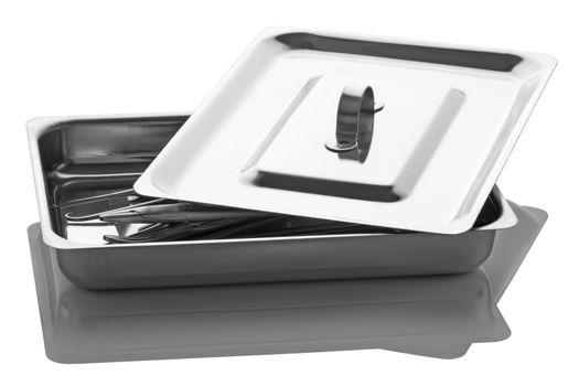 Tray with surgical tools from stainless steel isolated on a white background