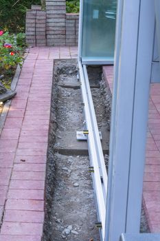 Construction site for a new conservatory, patio roof porch.