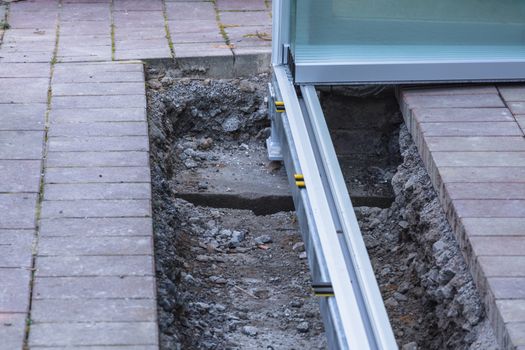 Construction site for a new conservatory, patio roof porch.