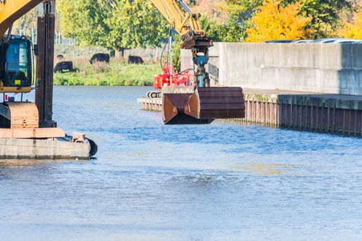 Dredging in the harbor basin.