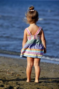 Small girl on the beach in Larnaka, Cyprus