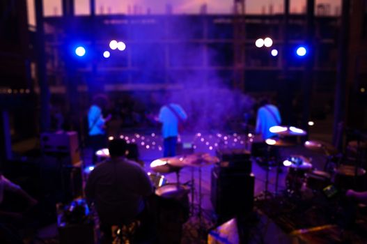 Blur or Defocus Background of Music Band Perform in Concert from Back stage