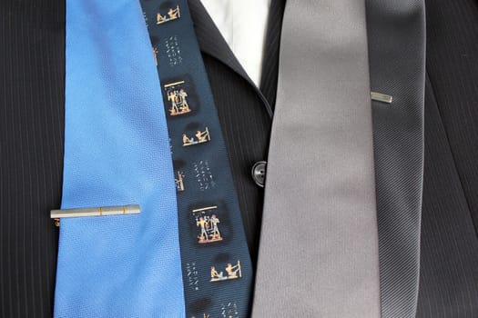 Some ties on a choice to a business suit