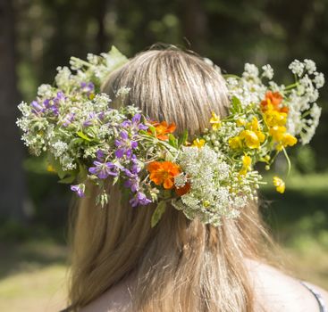 Swedish Midsummer Headgear Traditional on a female head of hair.