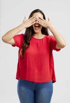 Lovey woman covering her eyes with hands