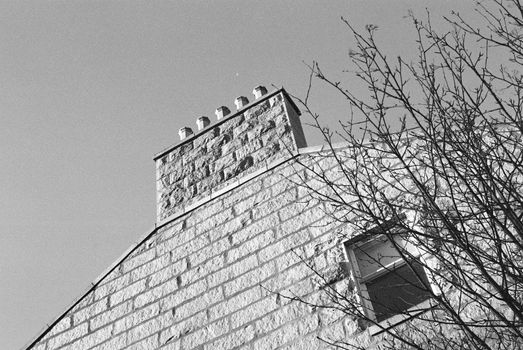 Black and white film photograph of a building in Aberdeen