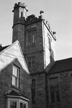Black and white film photograph of a building in Aberdeen