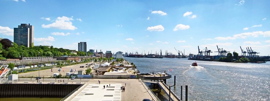 Hamburg, Germany - May 24, 2008: Hamburg harbor - panorama, street Grosse Elbstrasse on the left, container terminal / Norderelbe on the right.