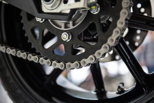 Modern motorcycle drive chain closeup. Shallow dof