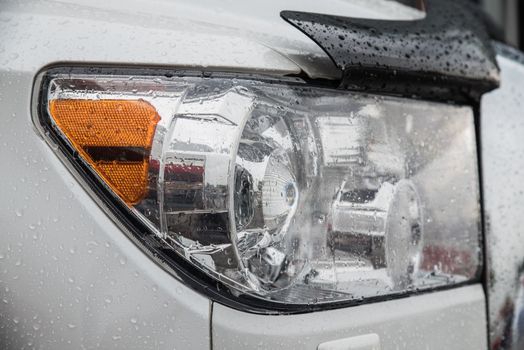 raindrops on modern car in rainy season