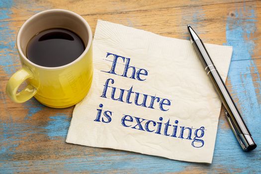 The future is exciting - handwriting on a napkin with a cup of coffee