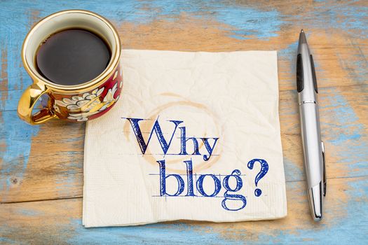 Why blog question - handwriting on a napkin with a cup of coffee