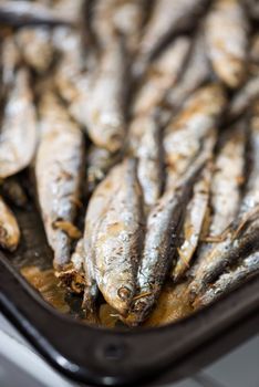 Fresh crispy fried Smelts in the pan. Close-up.