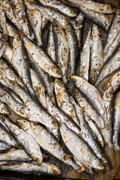 Fresh crispy fried Smelts in the pan. Close-up.