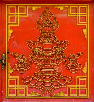 Red Tibetan door in Kathmandu, Nepal