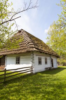 old traditional wooden polish cottage in open-air museum, Ethnographic Park, Kolbuszowa, Poland