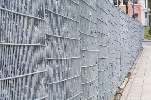 Gabion filled with thick stones; Metal Stone basket with large natural stones for external landscaping.