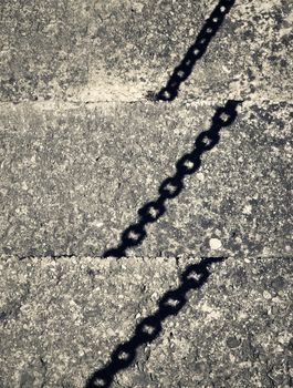 abstract background ripped shadow chains on concrete stairs