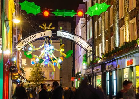 LONDON, UK - CIRCA DECEMBER 2011: Christmas decoration at Carnaby Street.