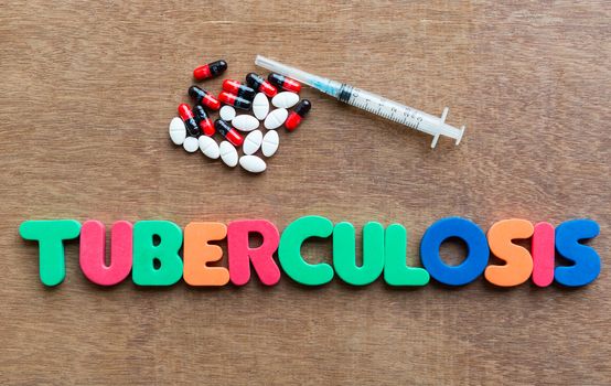 tuberculosis colorful word in the wooden background