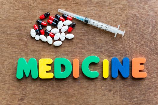 medicine colorful word in the wooden background