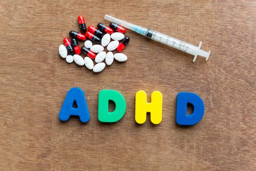 adhd colorful word in the wooden background