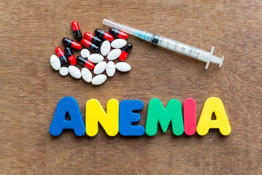 anemia colorful word in the wooden background