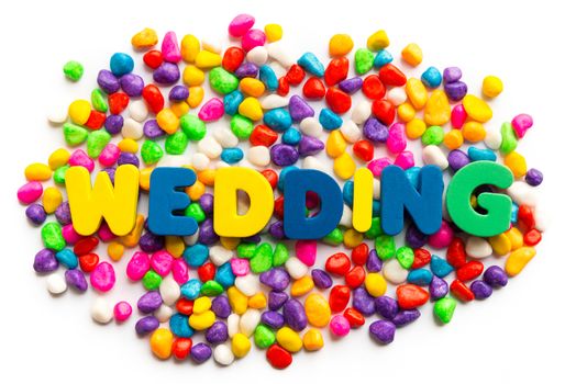 wedding word on colorful stone