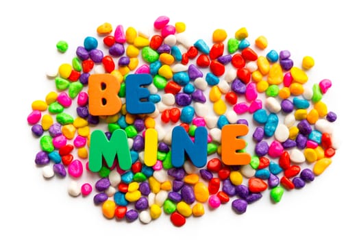 be mine word on colorful stone