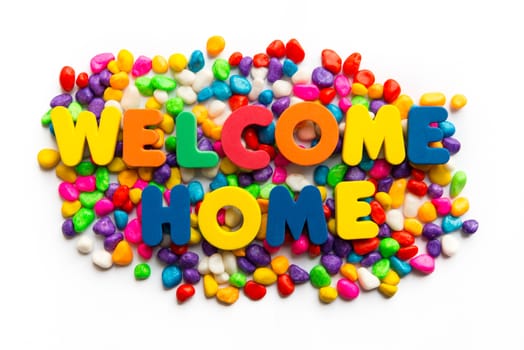 welcome home word in colorful stone