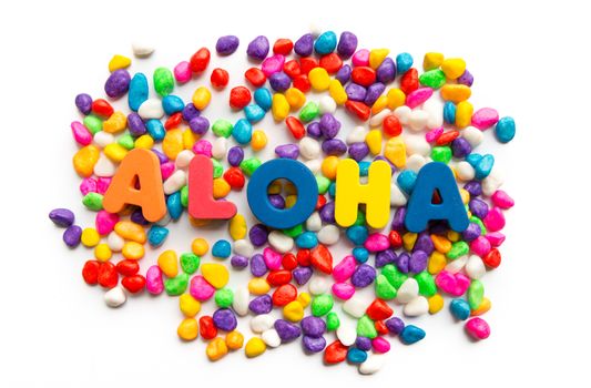 aloha word in colorful stone