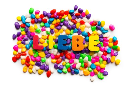 liebe german word in colorful stones