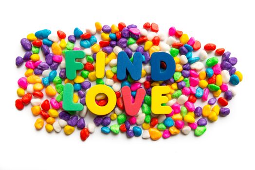 find love word in colorful stone