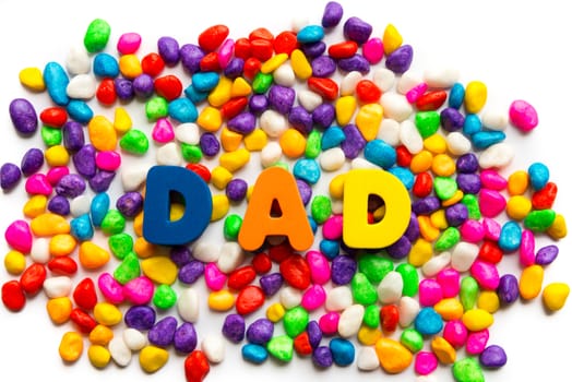 dad word in colorful stones