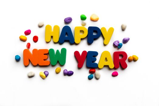 Happy New year word in colorful stones