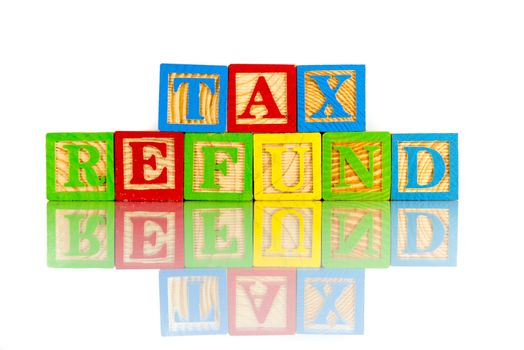 tax refund words reflection on white background