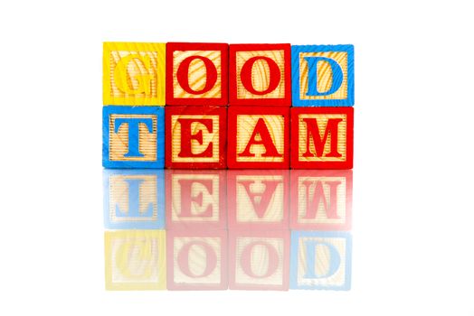 good team words reflection on white background