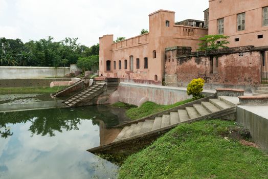 Manikgonj, Bangladesh - August 8: The great Baliati Zomidar Bari is located at the Saturia Upozila of Manikganj district. Name of the village is Baliati. This building is about 200 years of old. Gobinda Ram Shaha was the settler of the Zomidari at Baliati. He was a salt merchant. His forefather was poor and started small business. Later he owned that from his parent. Then he extended that business further and established Zomidari.
Photo taken on: August 8, 2014