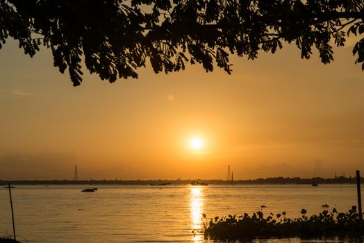 Sunset at river in Mirpur Beribadh, Bangladesh