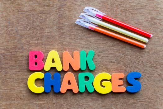 bank charges colorful word on the wooden background