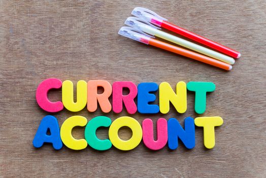 current account colorful word on the wooden background