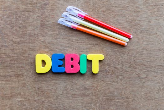 debit colorful word on the wooden background