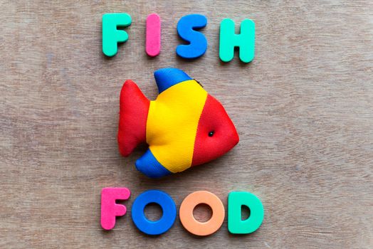 fish food colorful word on the wooden background
