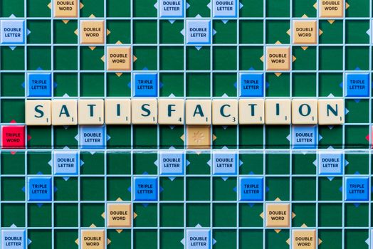 satisfaction word on the colorful game board