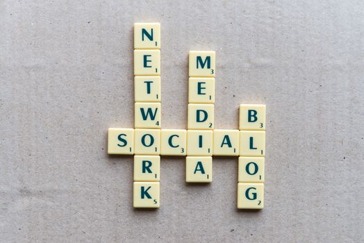 Social Network Crossword blocks on the wooden background