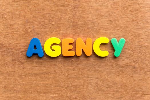 agency colorful word on the wooden background